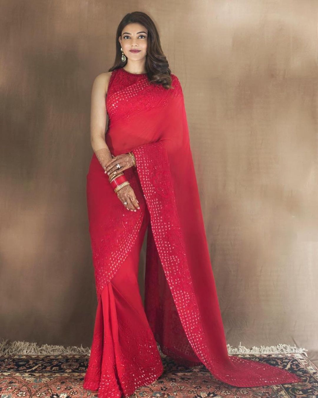 Kajal Aggarwal's Diwali look in red plain saree