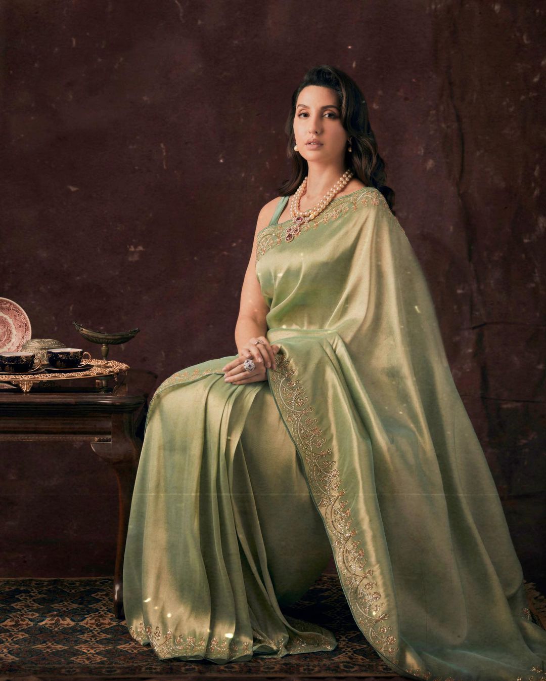 Nora Fatehi's Diwali look in light green saree