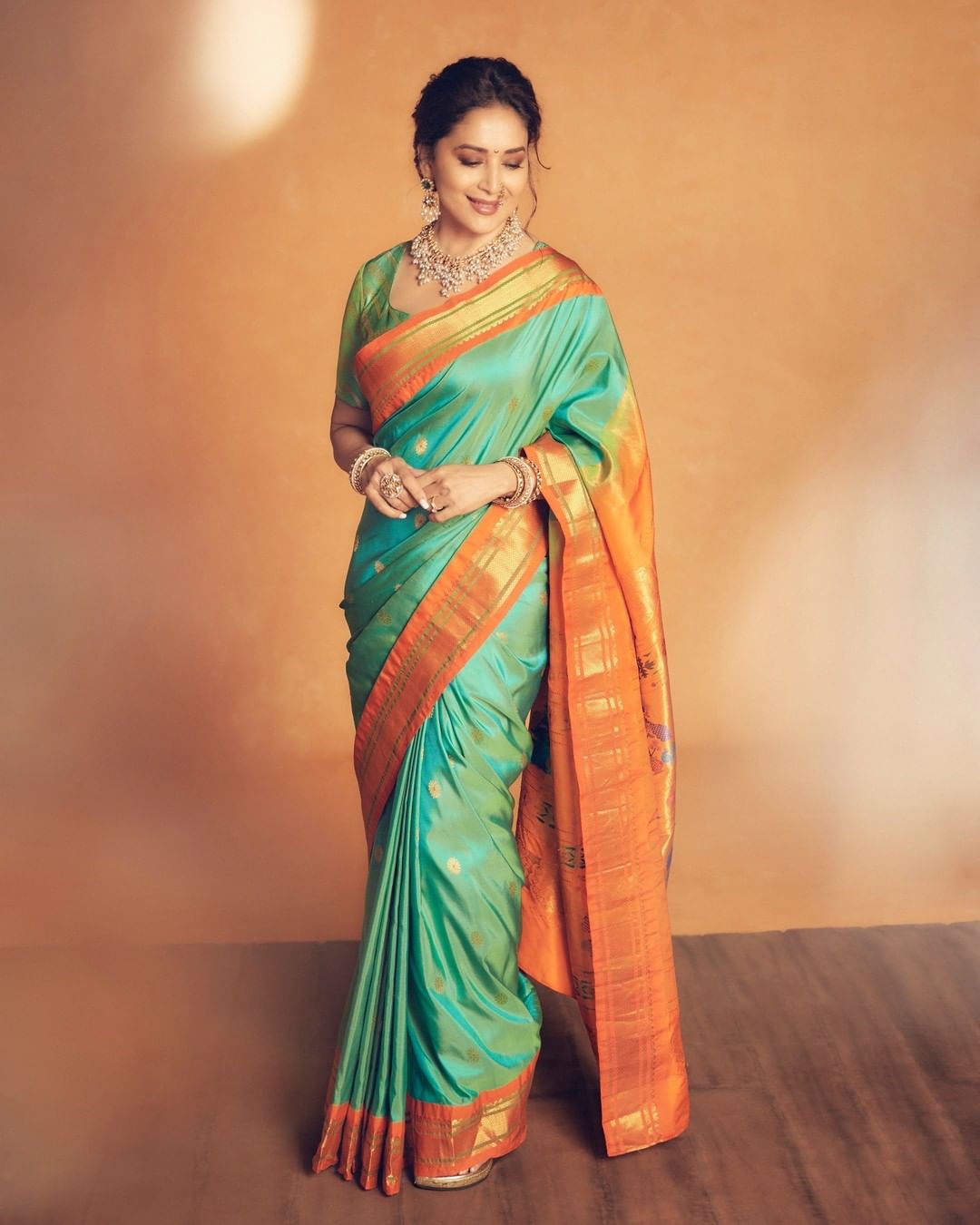 Madhuri DIxit's diwali look in Green silk saree