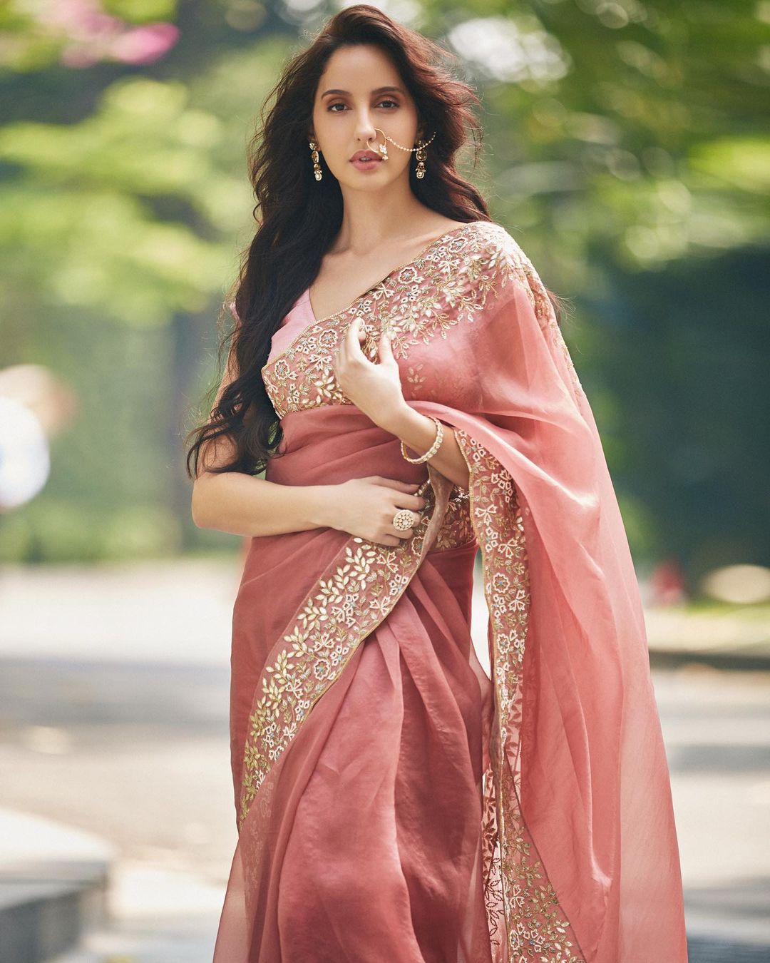 Nora Fatehi's Diwali look in peach saree