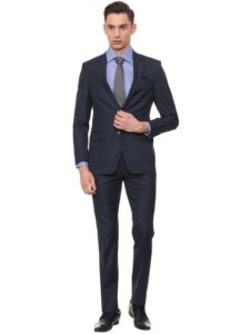 Man in business formal wearing Navy suit